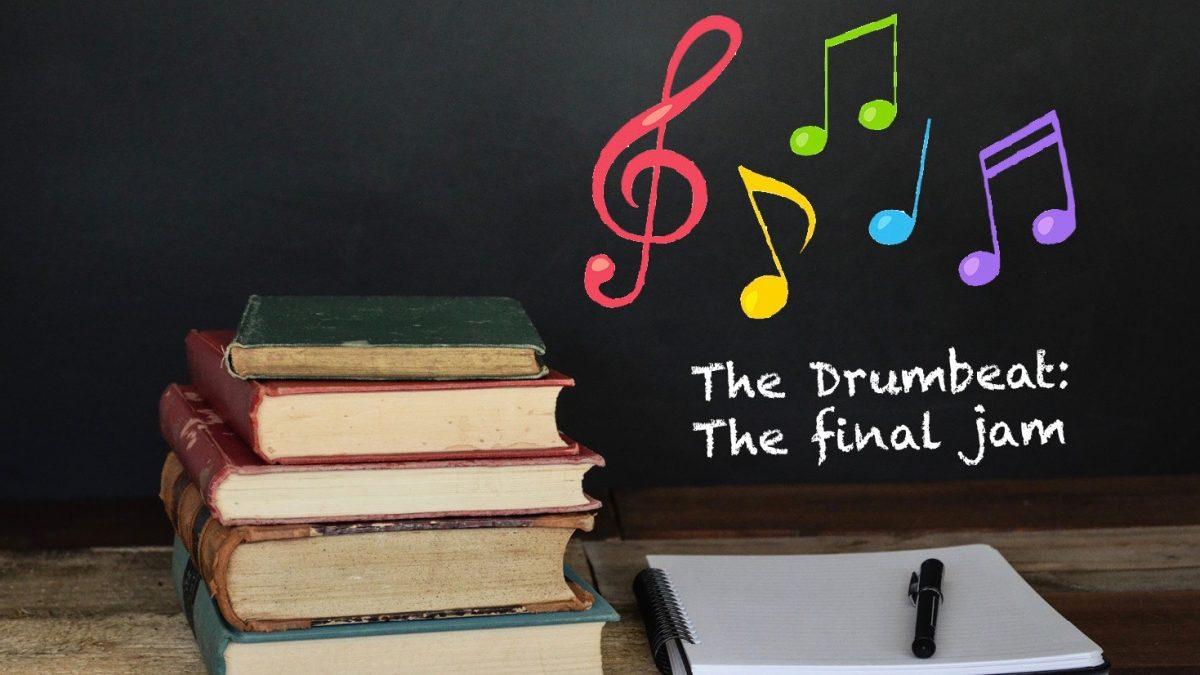 Books sitting on a desk with a note pad next to it and the words the drumbeat final jam are wrtitten on chalkboard below musical notes