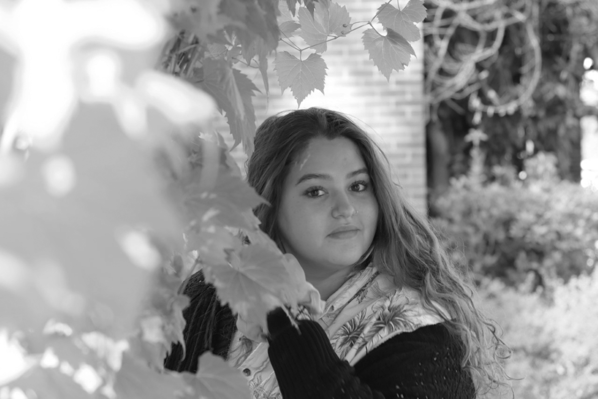 Marie Salazar standing in a garden