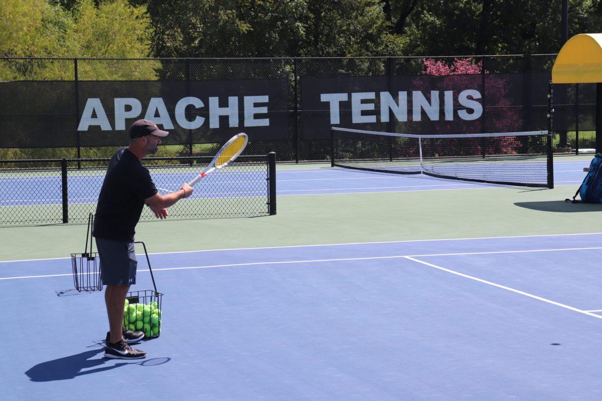Tennis coach 'dashes' into coach of the year title