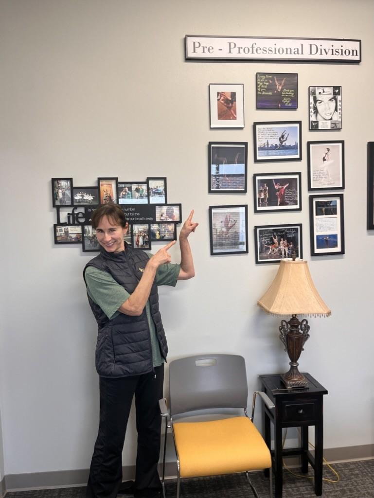 Shurrell Wiebe showcases dancers on her wall. She started her dance journey at 2-years-old.