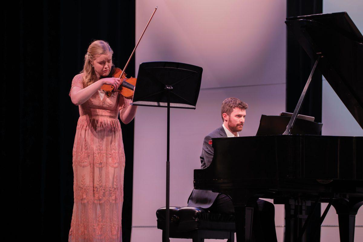 Anna and Dr. Kaden Larson perform as a violin and piano duo for TJC’s masterclass and recital at the Rogers Palmers Performing Arts Center on Feb. 20. The Larsons both have musical backgrounds in their respective fields of music and continue to teach as well as perform recitals.