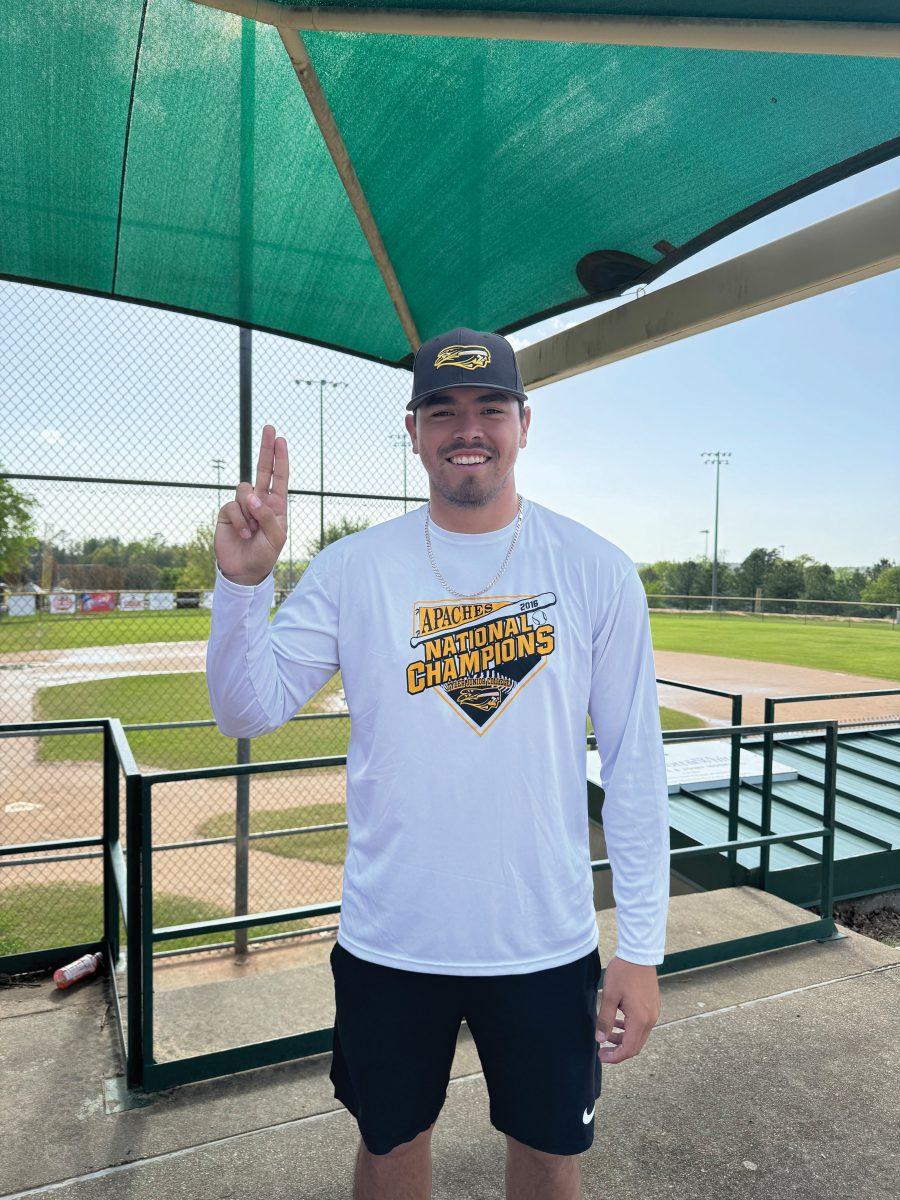 Assistant baseball coach, Miguel "Miggy" Vega, puts his feathers up. Vega began his career at TJC as a player on the Apache baseball team.