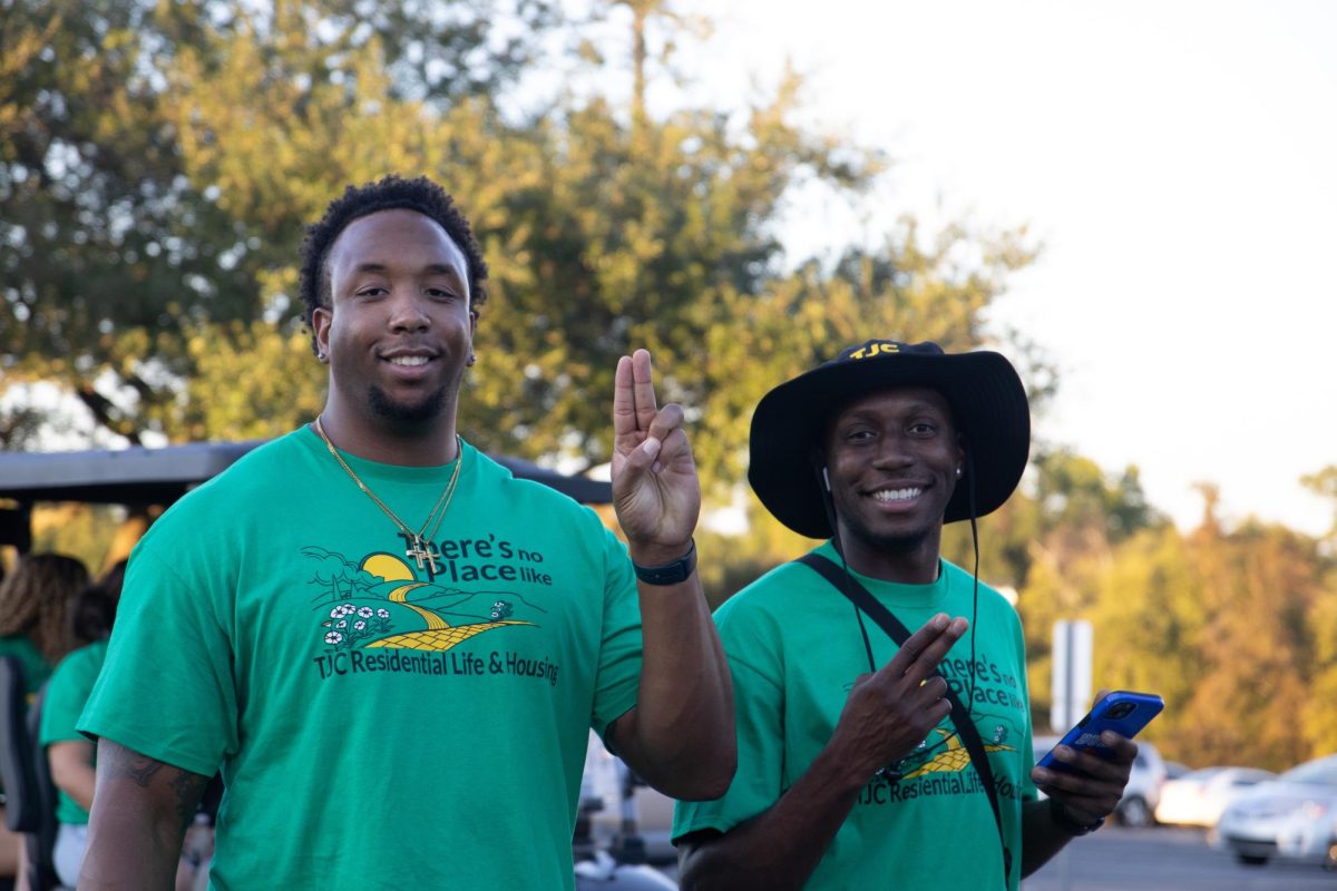 Feathers up! Tjc Students during Homecoming Parade
