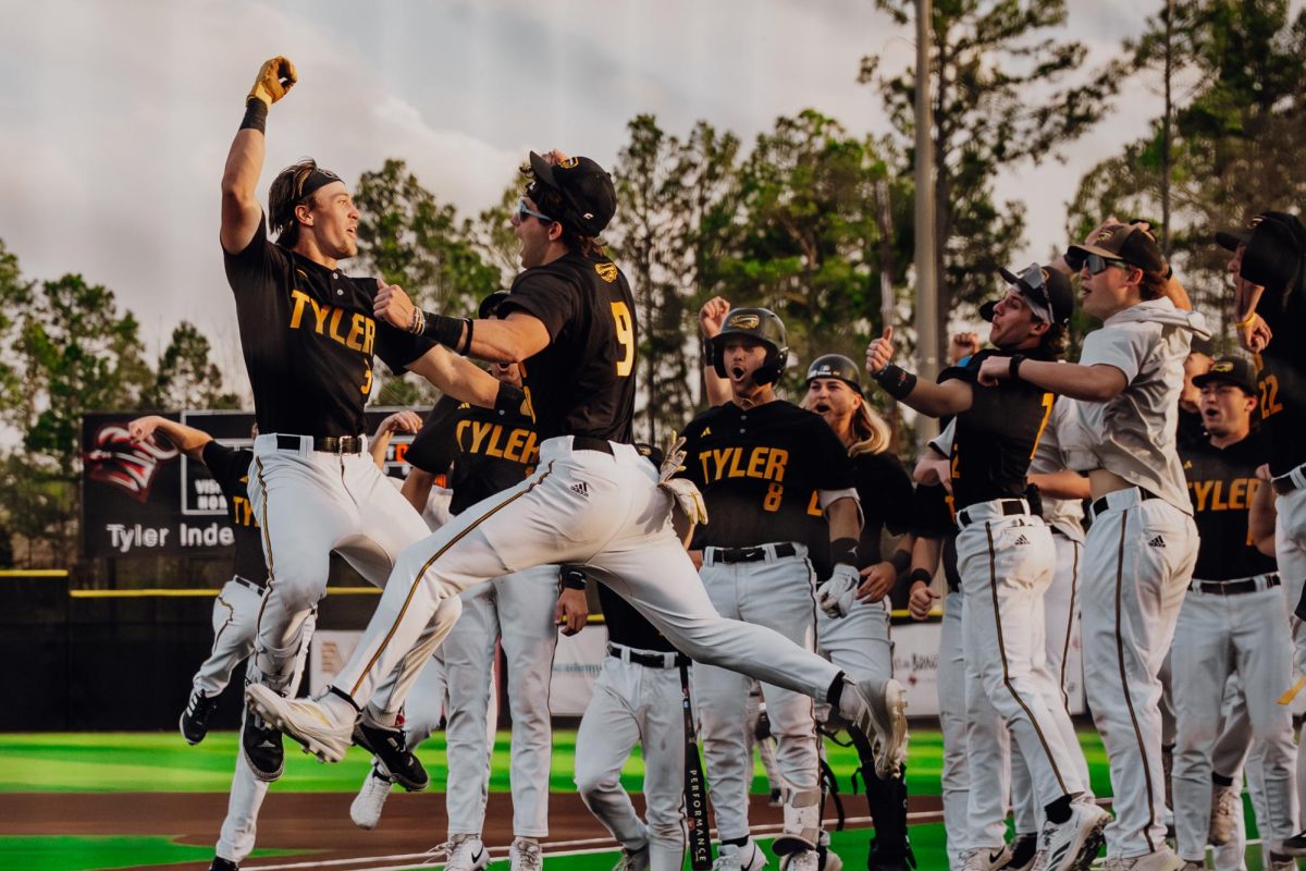 TJC Baseball celebrates Landry Stamps’ second home run during a game against Panola College. Teammates greet him at the dugout after the smash