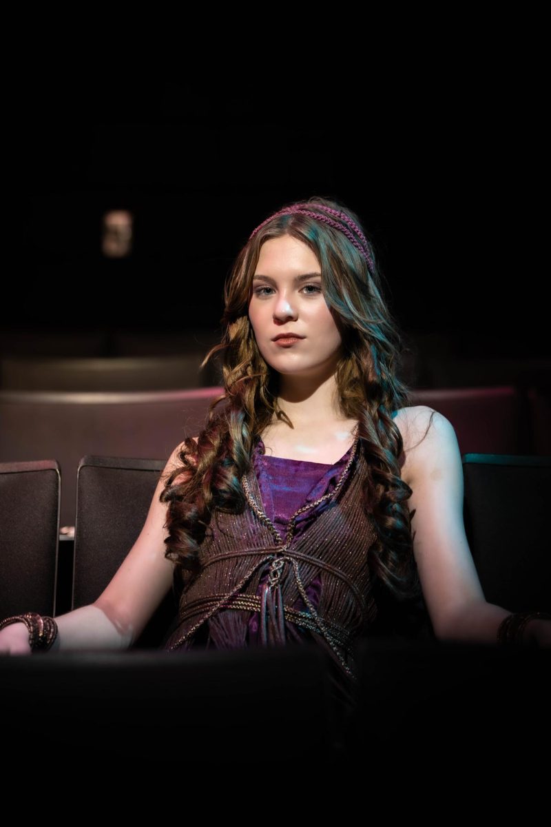 Bailey Thornburg poses with her full costume from her role as Antigone in TJC's theatre production of "Antigone." Posing in her regalia one last time, Thornburg exudes that she is where she is meant to be. Photo taken by Imogen Brown